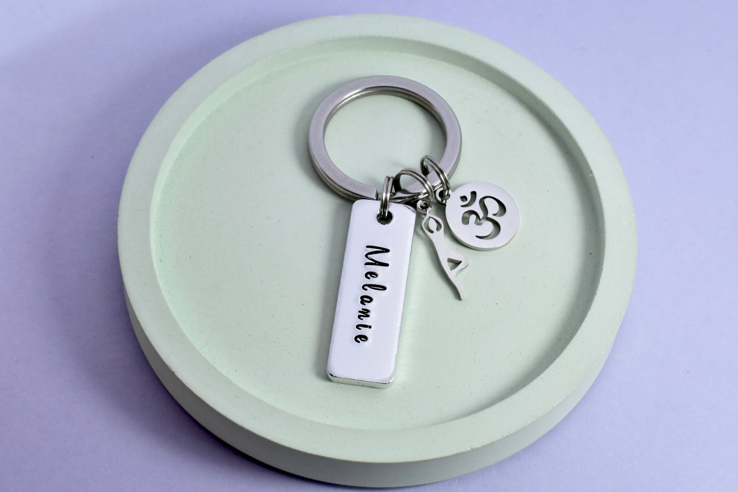 Silver aluminium rectangle yoga keyring. 