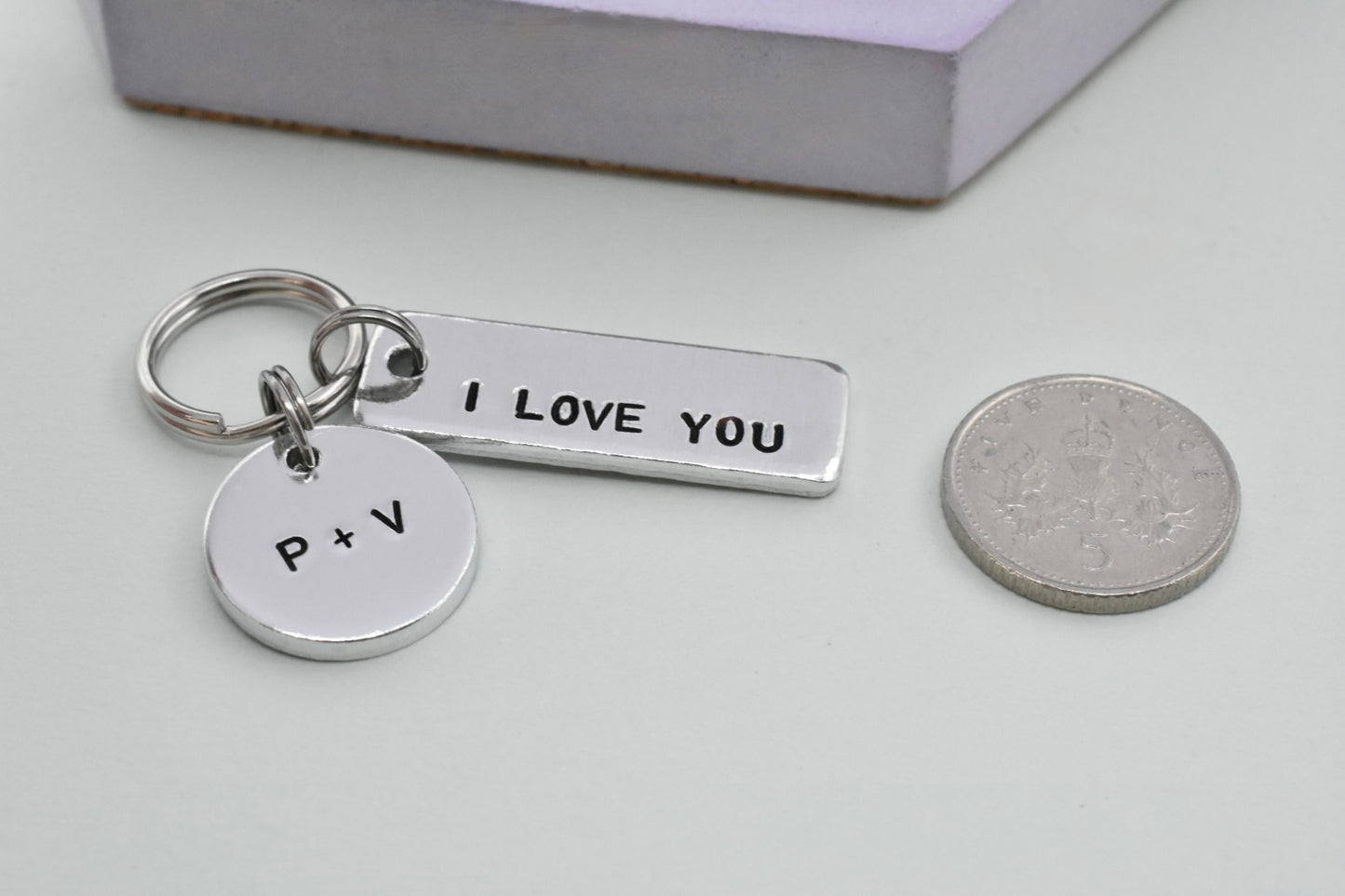 Personalised "I Love You More" Keychain: Discreet Romantic Gift