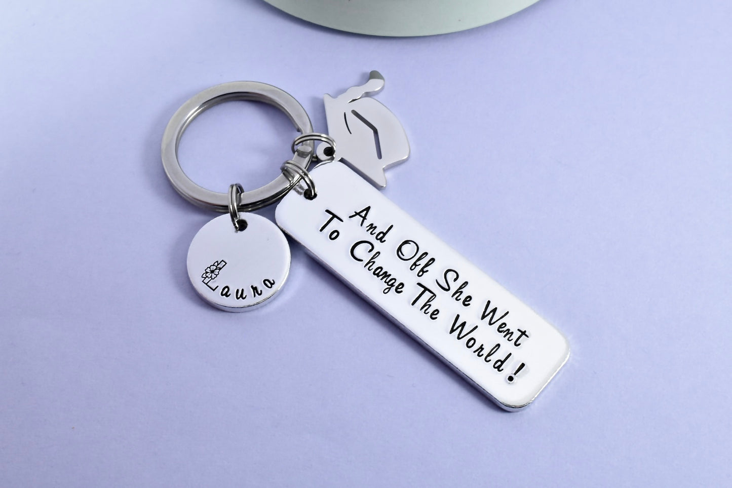 Personalised "And Off She Went To Change The World" Keyring • Graduation Keyring • Optional Mortarboard Charm • Grad Gift • Leaving Home