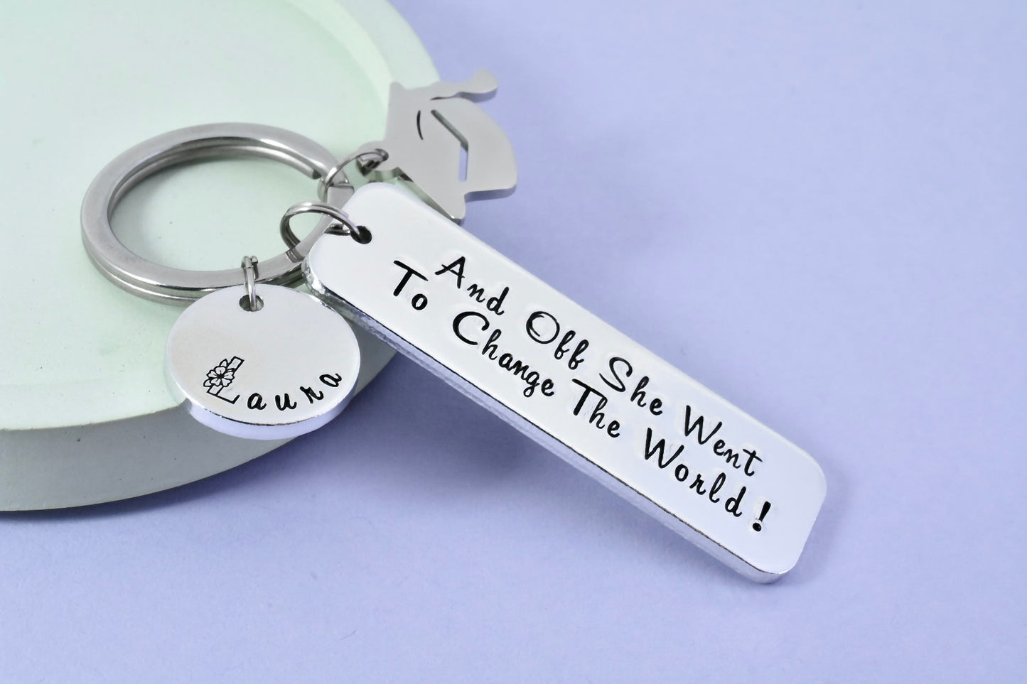 Personalised "And Off She Went To Change The World" Keyring • Graduation Keyring • Optional Mortarboard Charm • Grad Gift • Leaving Home