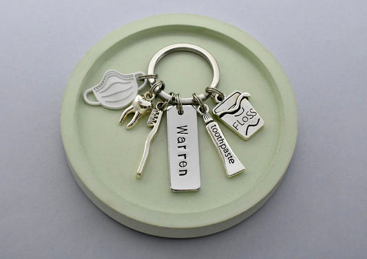 Keychain with dental-themed charms with personalised tag
