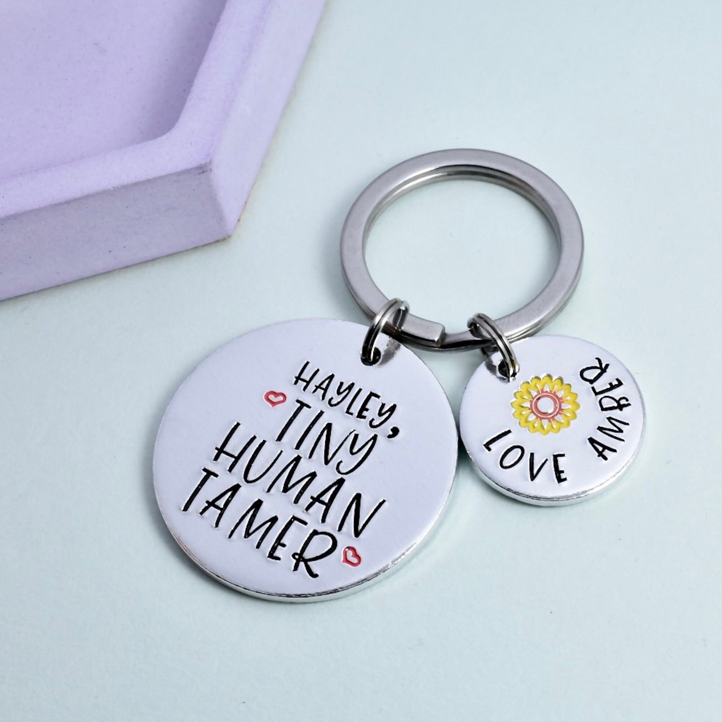 Silver aluminium disc keyring, for caregiver "tiny human tamer" and personalised "love from" disc