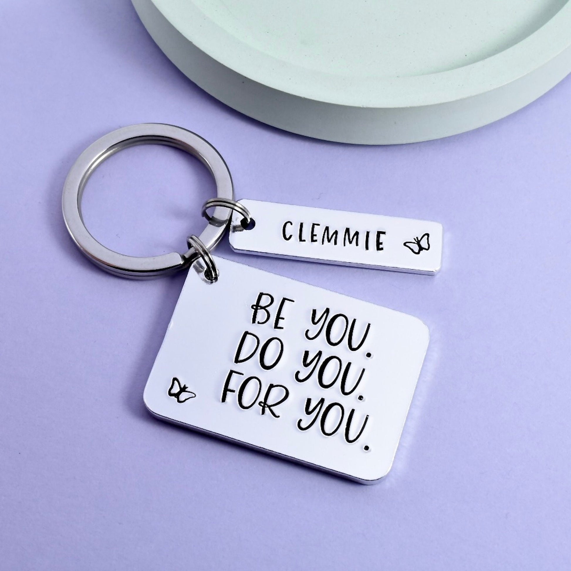 A personalised motivational keyring with a quote "BE YOU. DO YOU. FOR YOU.", a small rectangle can be personaliSed with a name, and a split ring for keys.